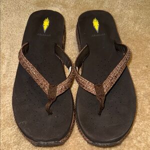 Brown Flip Flops with Black Soles